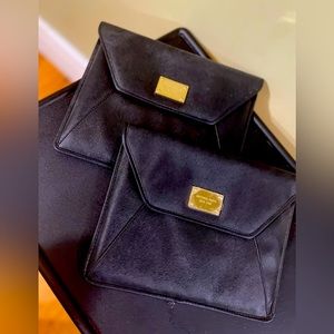 Micheal Kors Clutch purses set $50